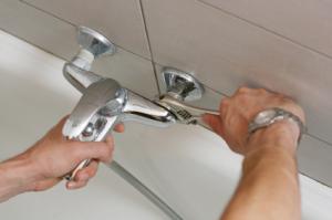 a service tech installs a Grohe faucet 